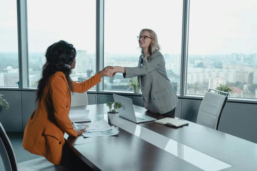 Financial advisor meeting one on one with a client to review her plan