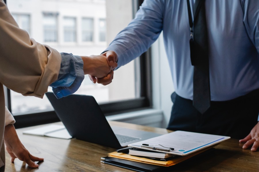 Shaking hands, partnering with divorce attorneys