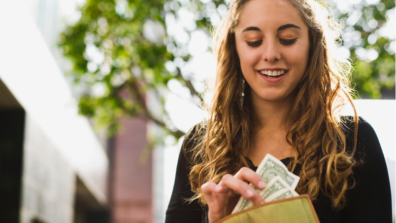 teen girl learning about money