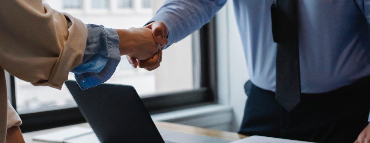 Shaking hands, partnering with divorce attorneys