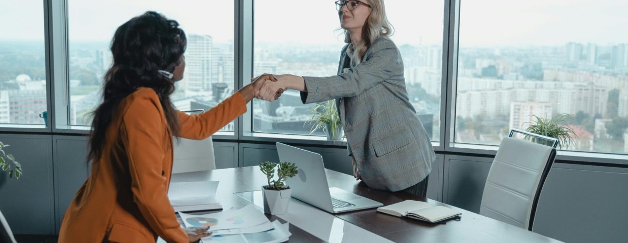 Financial advisor meeting one on one with a client to review her plan