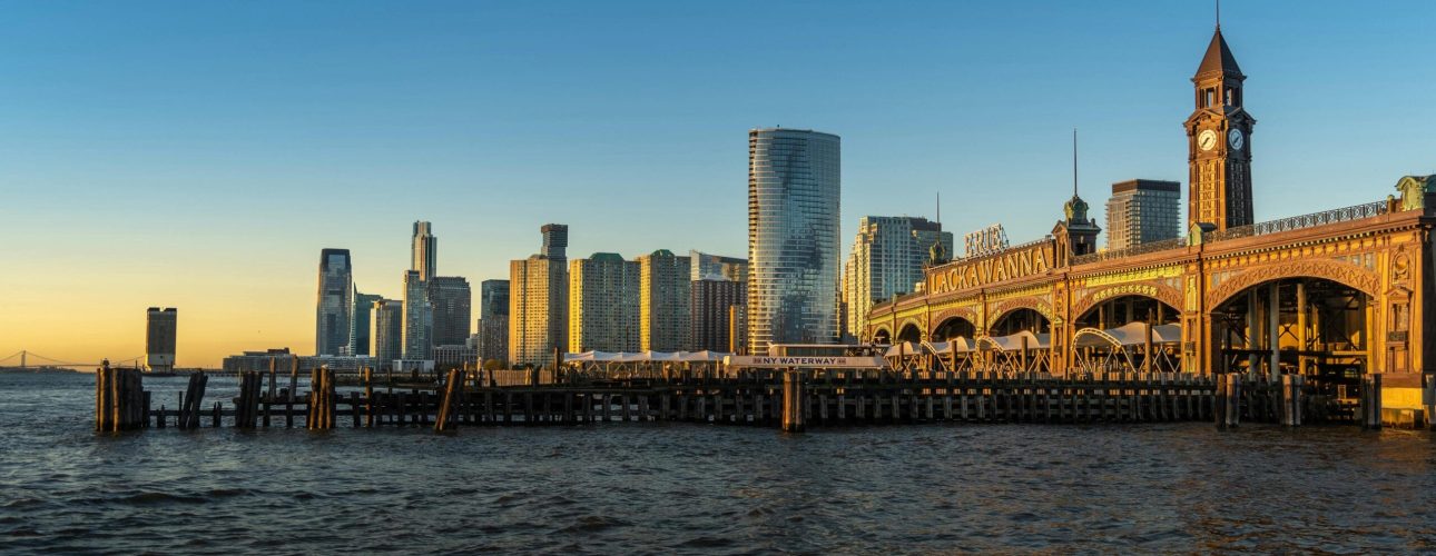 New York City skyline seen from Hoboken at sunset across the Hudson River